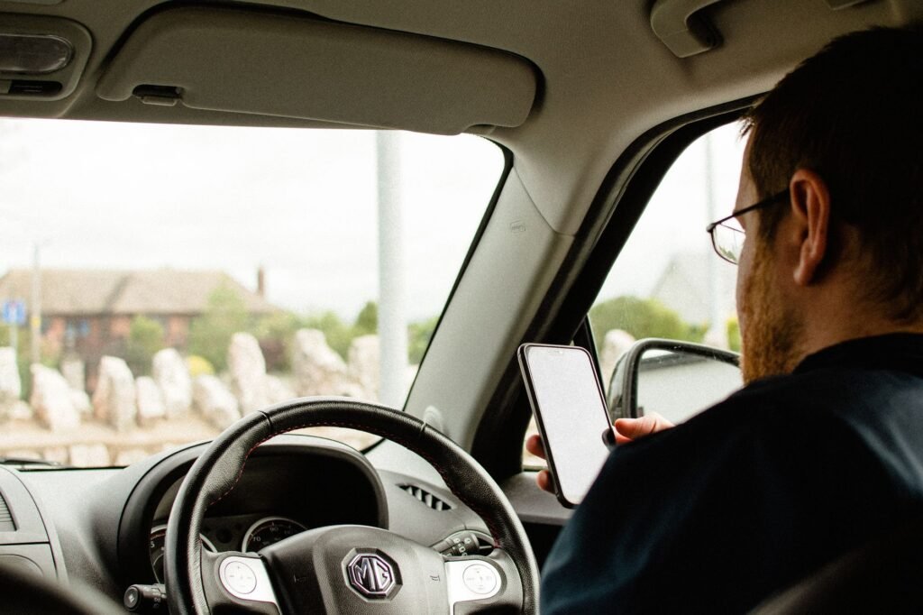 Adult checking arrangements while walking in Ballymena