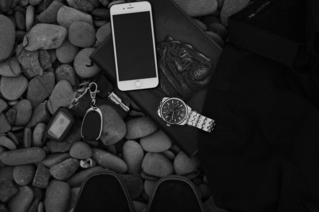 Phone, keys and notebook prepared for a planned meeting