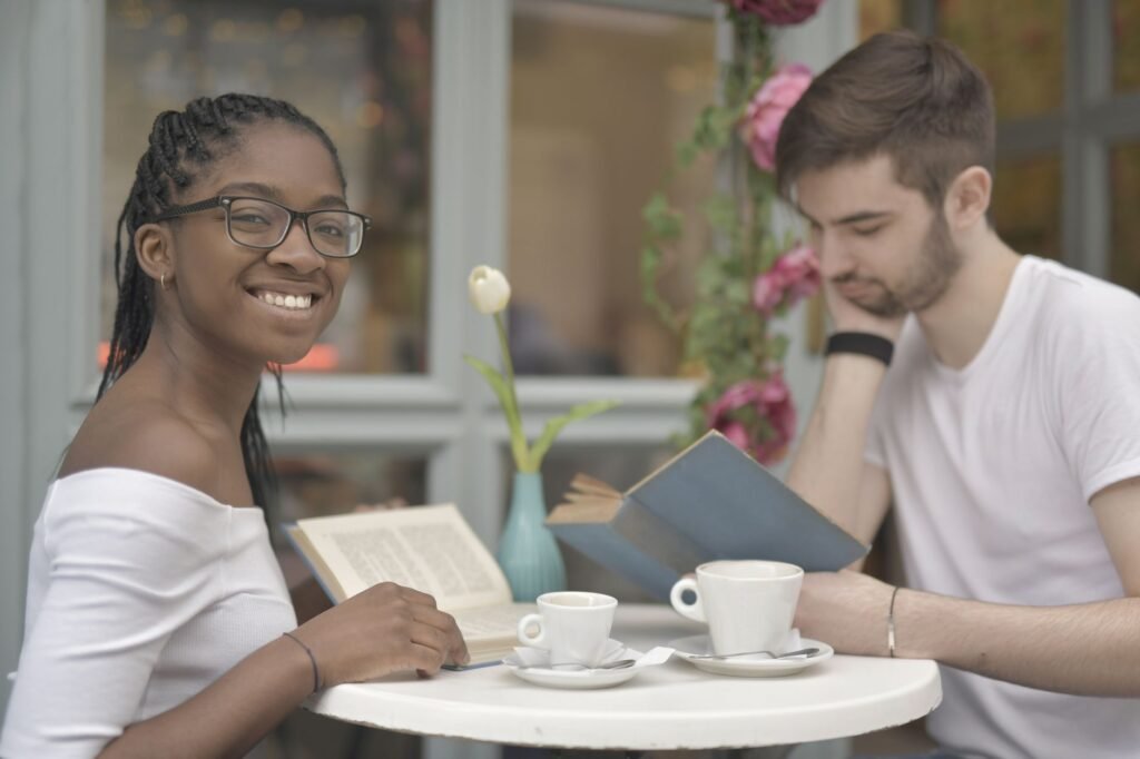 Two adults having a respectful conversation in a Reading cafe