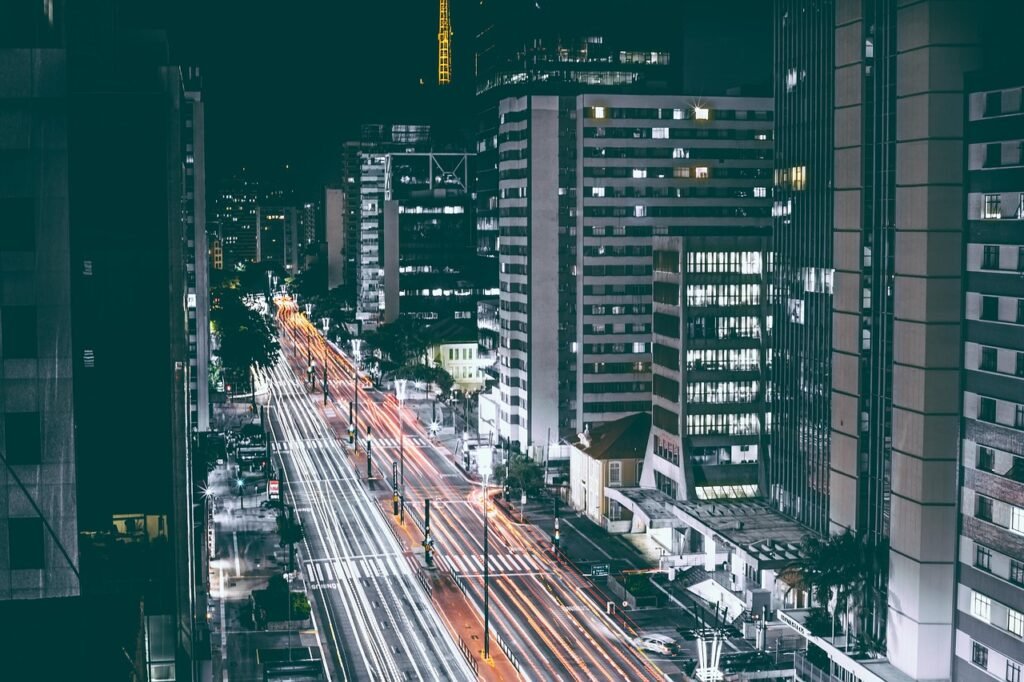 cars, traffic, buildings, city lights, motion blur, long exposure, illuminated, night, streets, skyscrapers, architecture, to