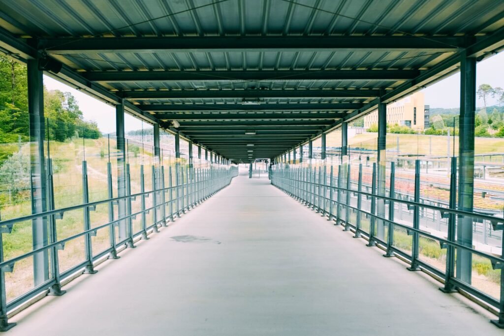 Visitor walking through a well-lit Blackburn transport area