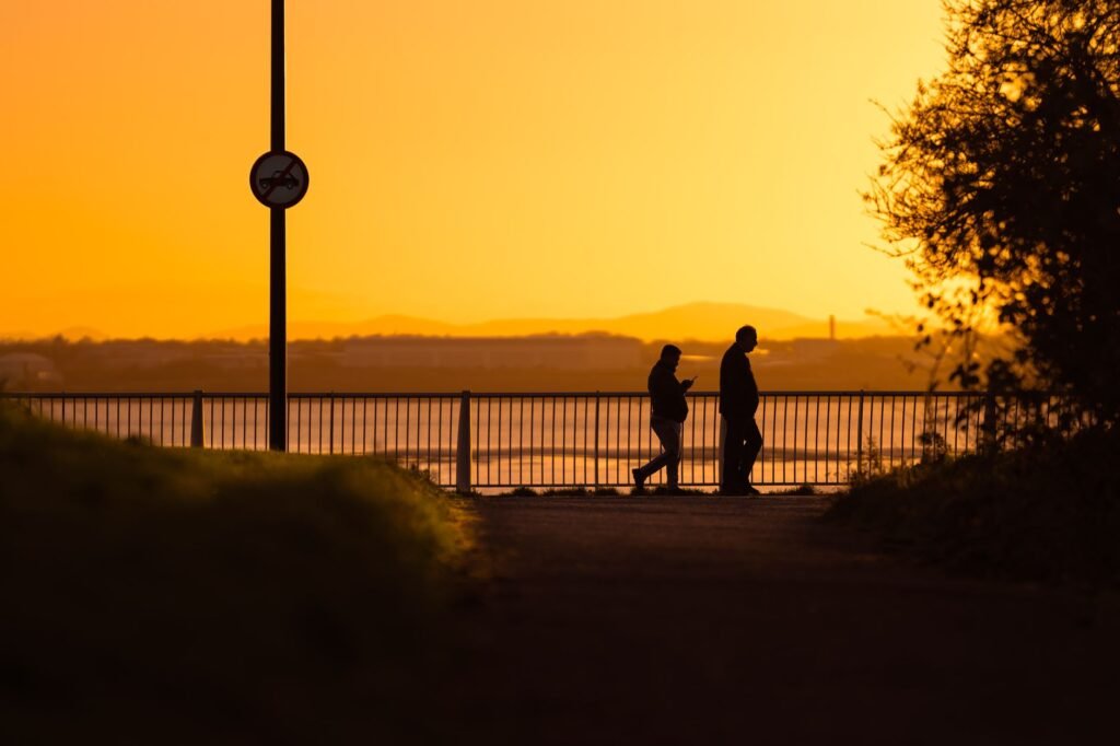 Adults enjoying a relaxed walk before dinner