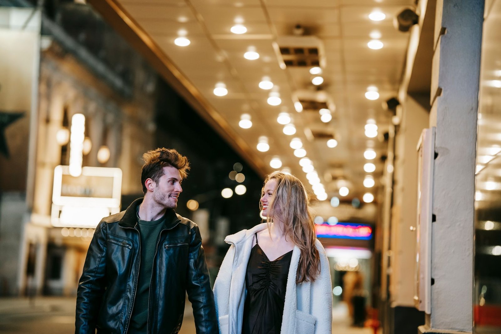 Two adults enjoying a relaxed evening walk in Coventry