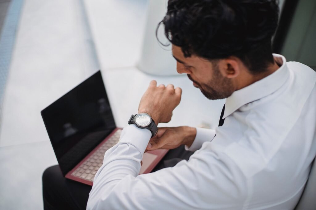 Adult checking travel details before the end of an evening date