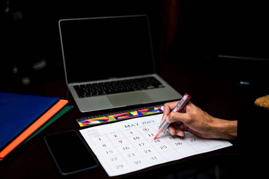 Visitor checking booking details at a hotel desk