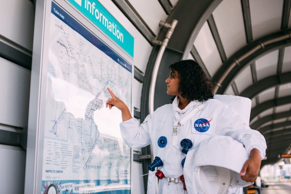 Visitor checking a map near a west London station