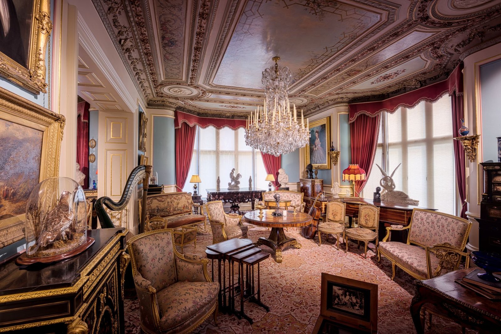 Stunning Victorian-era interior at Cliffe Castle in England, showcasing ornate design and vintage furnishings.