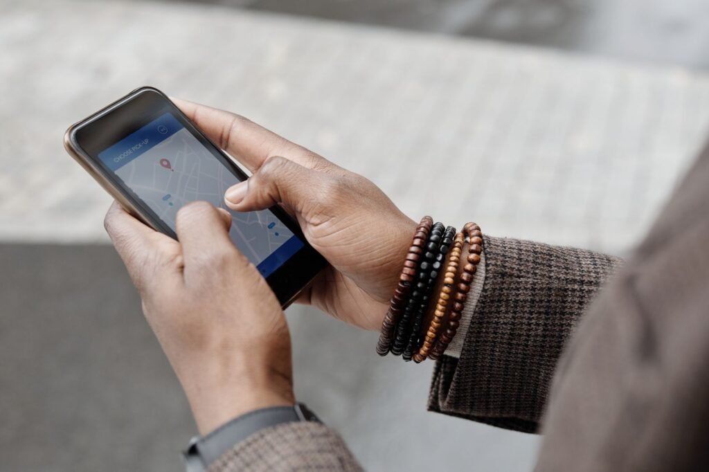 Person checking travel plans on a smartphone in Aberdeen