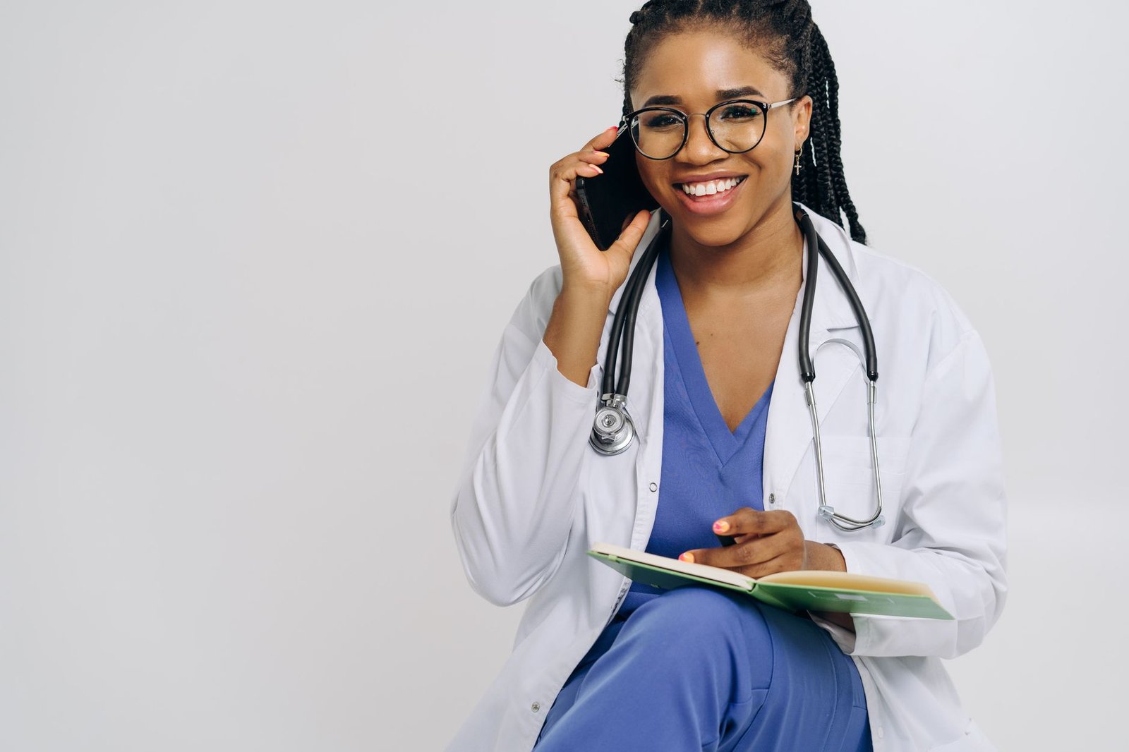 Smartphone and notebook used to plan a private appointment
