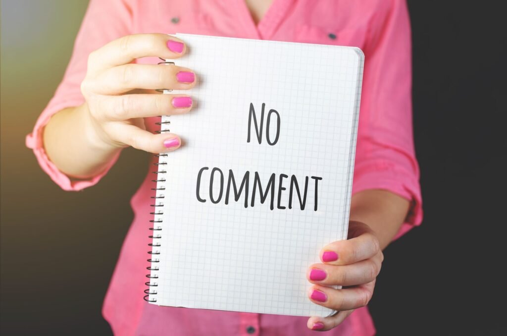 Person writing a discreet appointment message beside a notebook