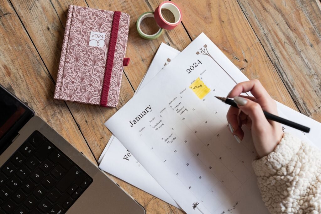 Phone and notebook used to confirm appointment details
