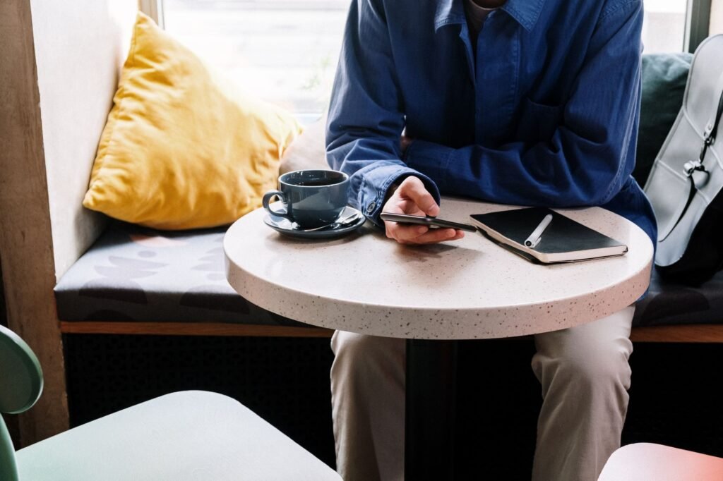 Notebook and phone used to organise a clear appointment plan