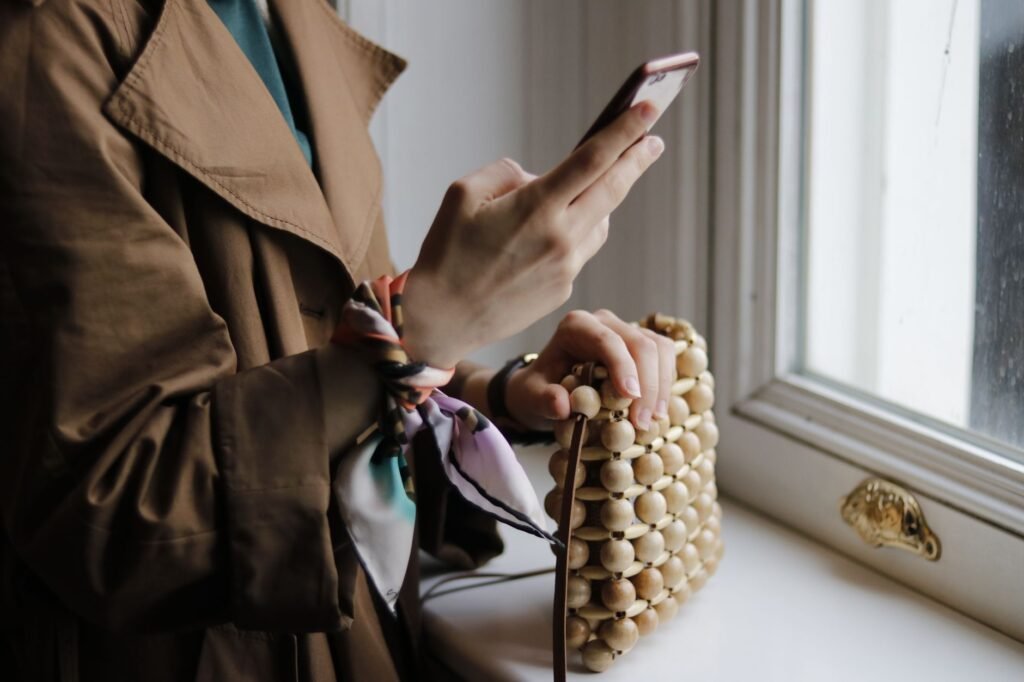 Traveller checking a phone before an appointment