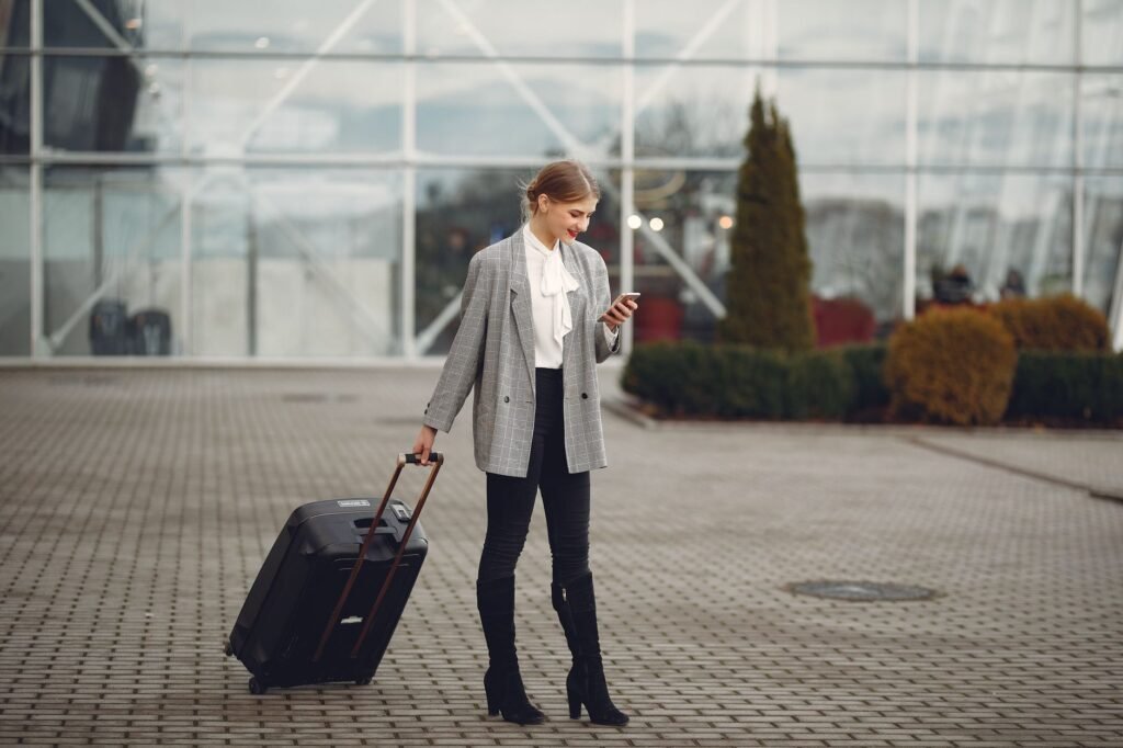 Traveller checking a phone before a planned appointment