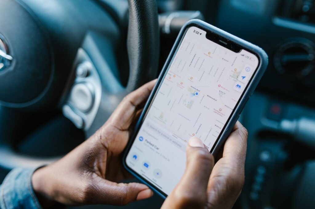 Person checking a phone and travel route