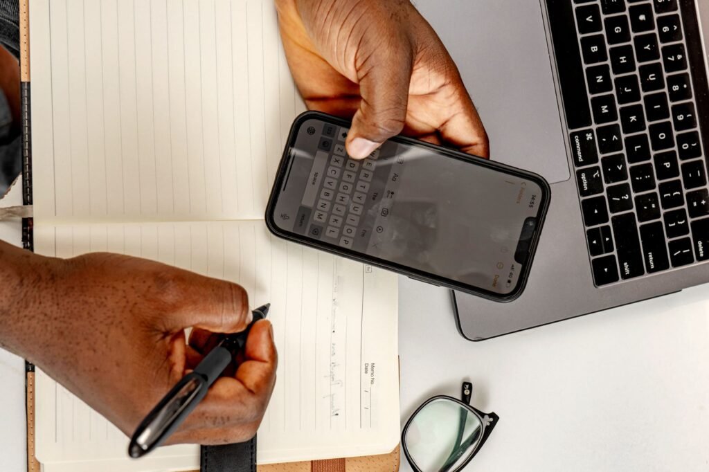 Hands composing a respectful appointment message on a smartphone