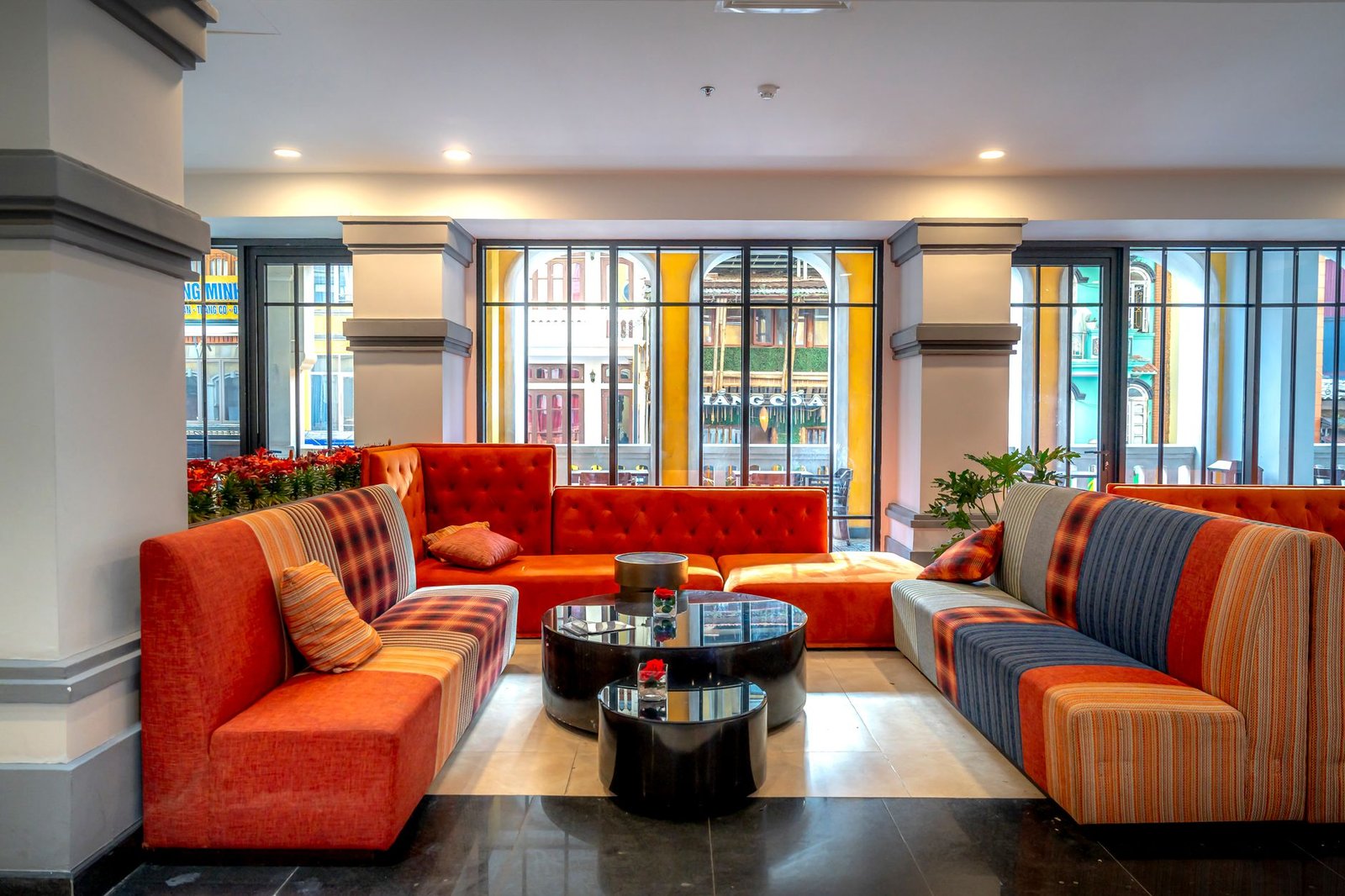 Adults having a discreet conversation in a Worcester hotel lounge