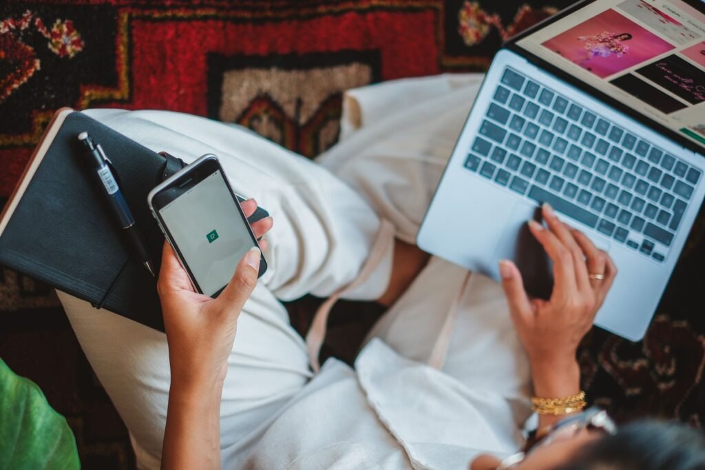 Hands typing a respectful booking message on a smartphone