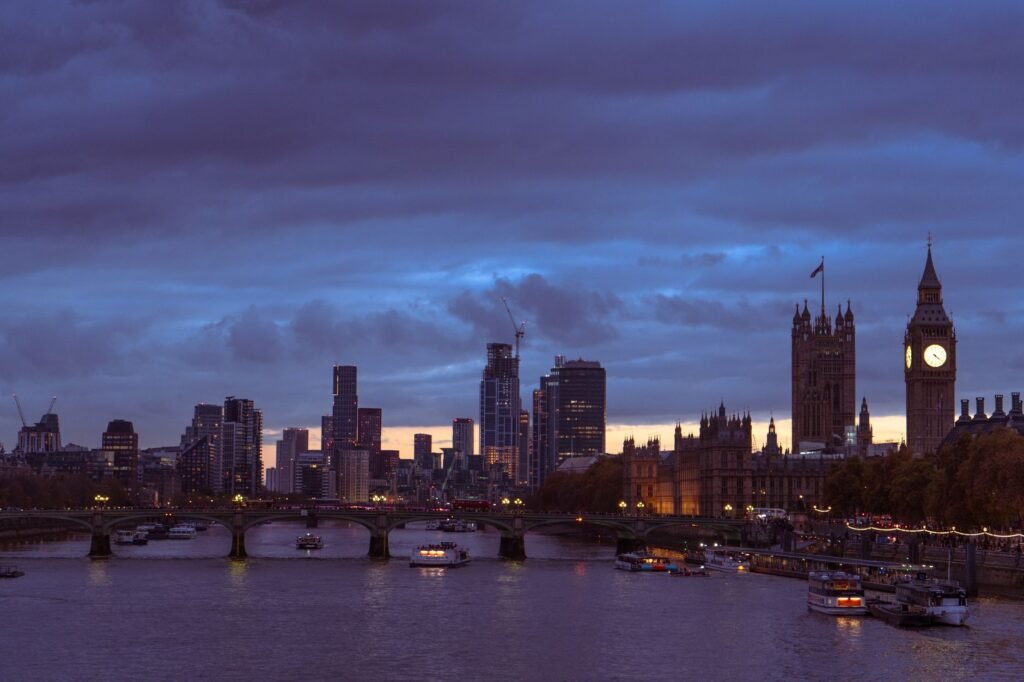 A stunning view of London's skyline at dusk, featuring Big Ben and the River Thames.