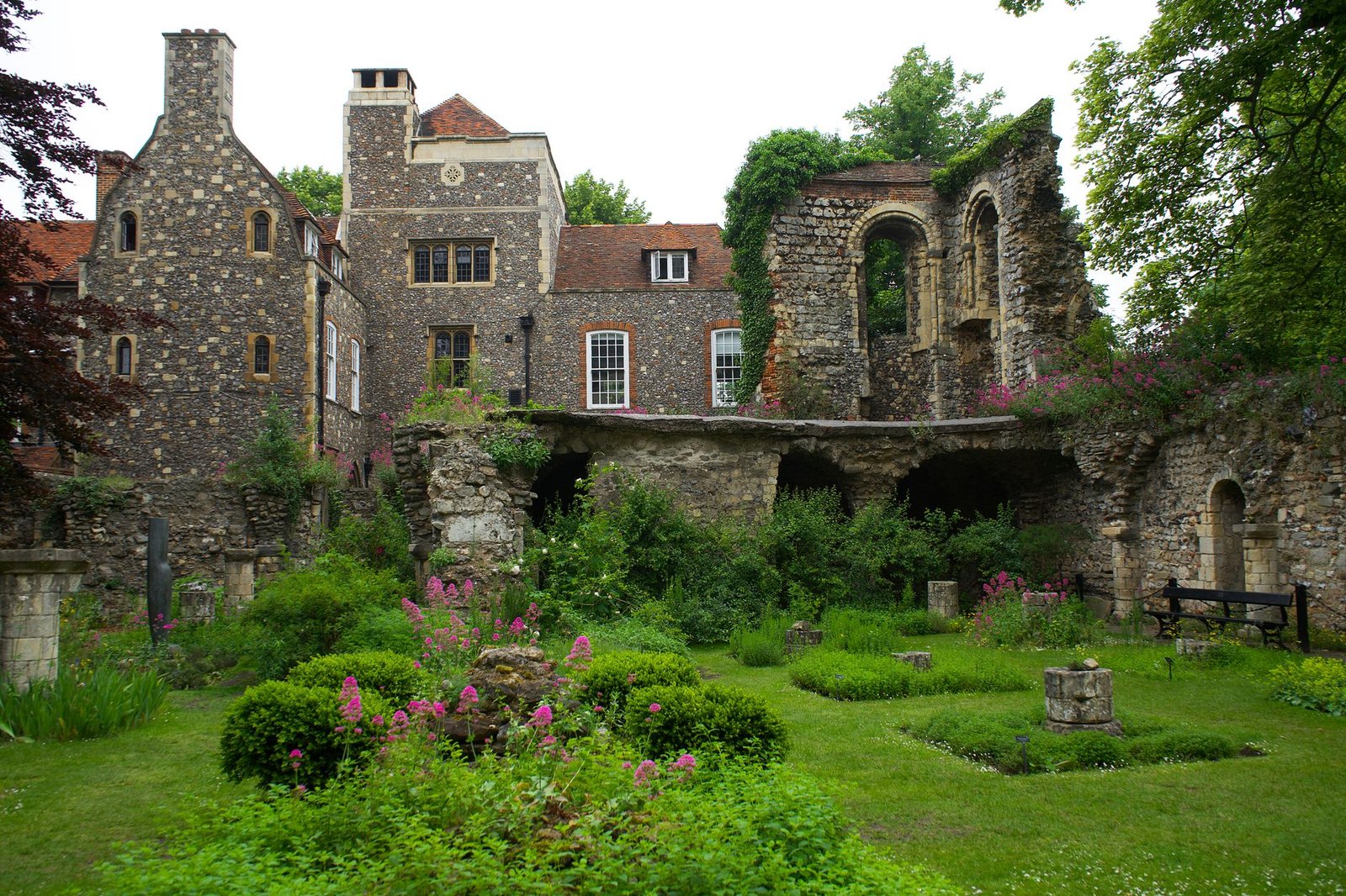 Medieval architecture with garden view in Canterbury, England.