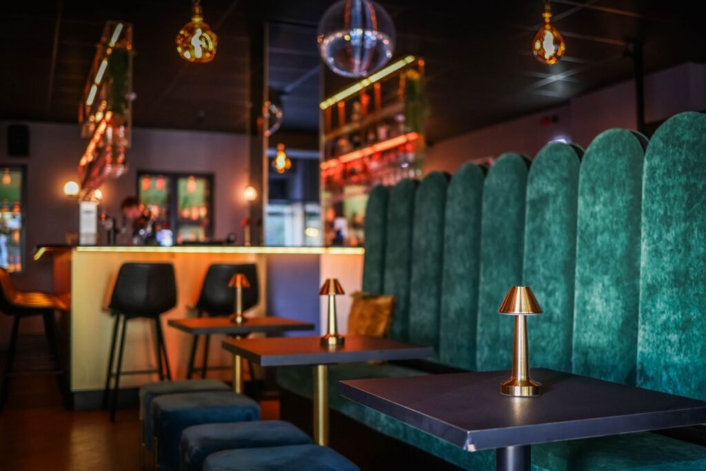 Sophisticated nightclub interior featuring velvet seating, ambient lighting, and contemporary design.