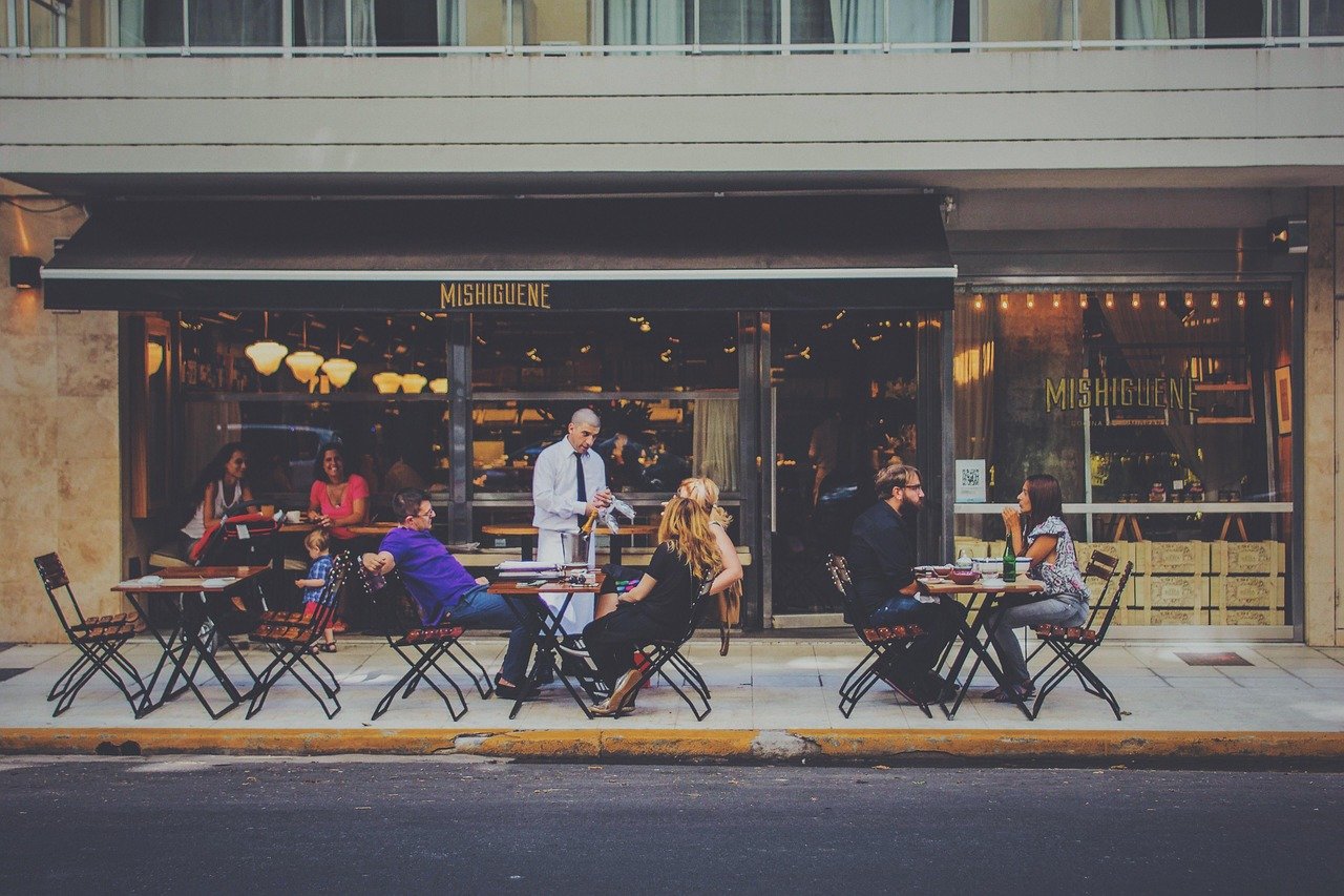 outdoor dining, restaurant, bar, waiter, al fresco, city, customers, group, patrons, people, street, tables, chairs, restaura
