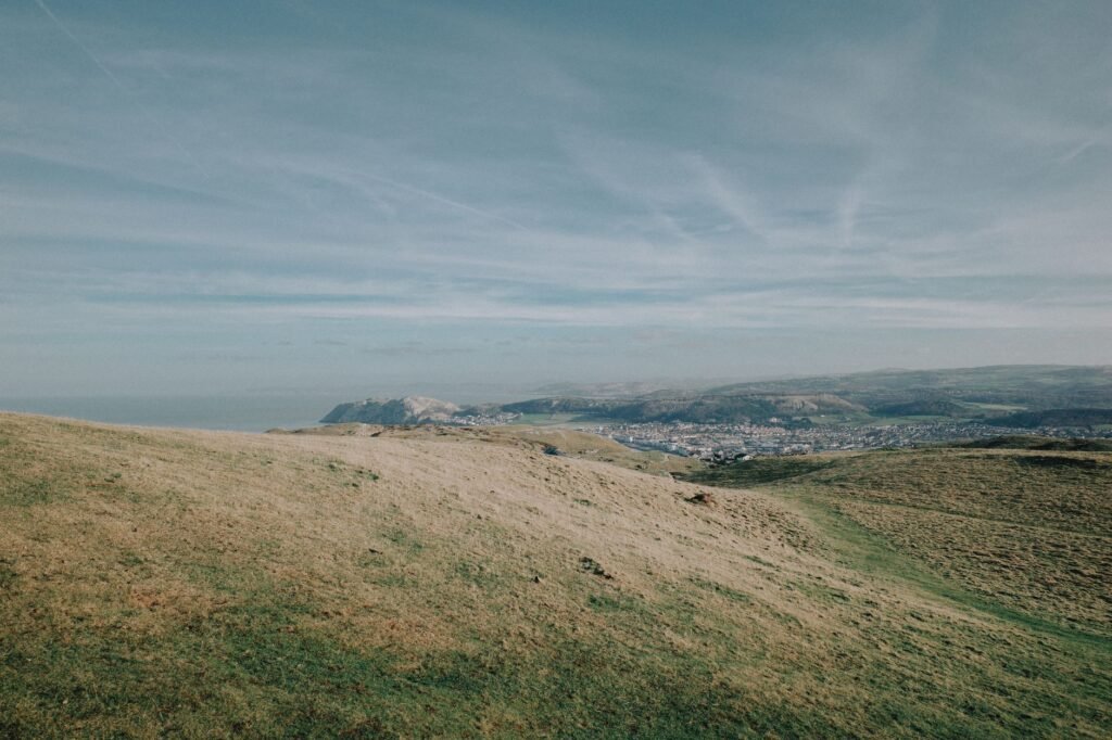 Breathtaking landscape of the Welsh hills and coast, showcasing natural beauty and tranquility.