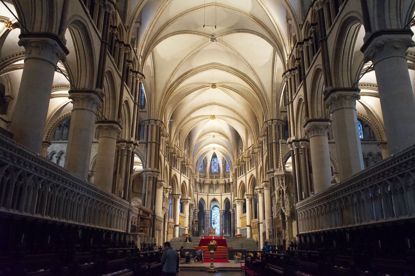 Interior view of the majestic Gothic arches in Canterbury Cathedral, England.