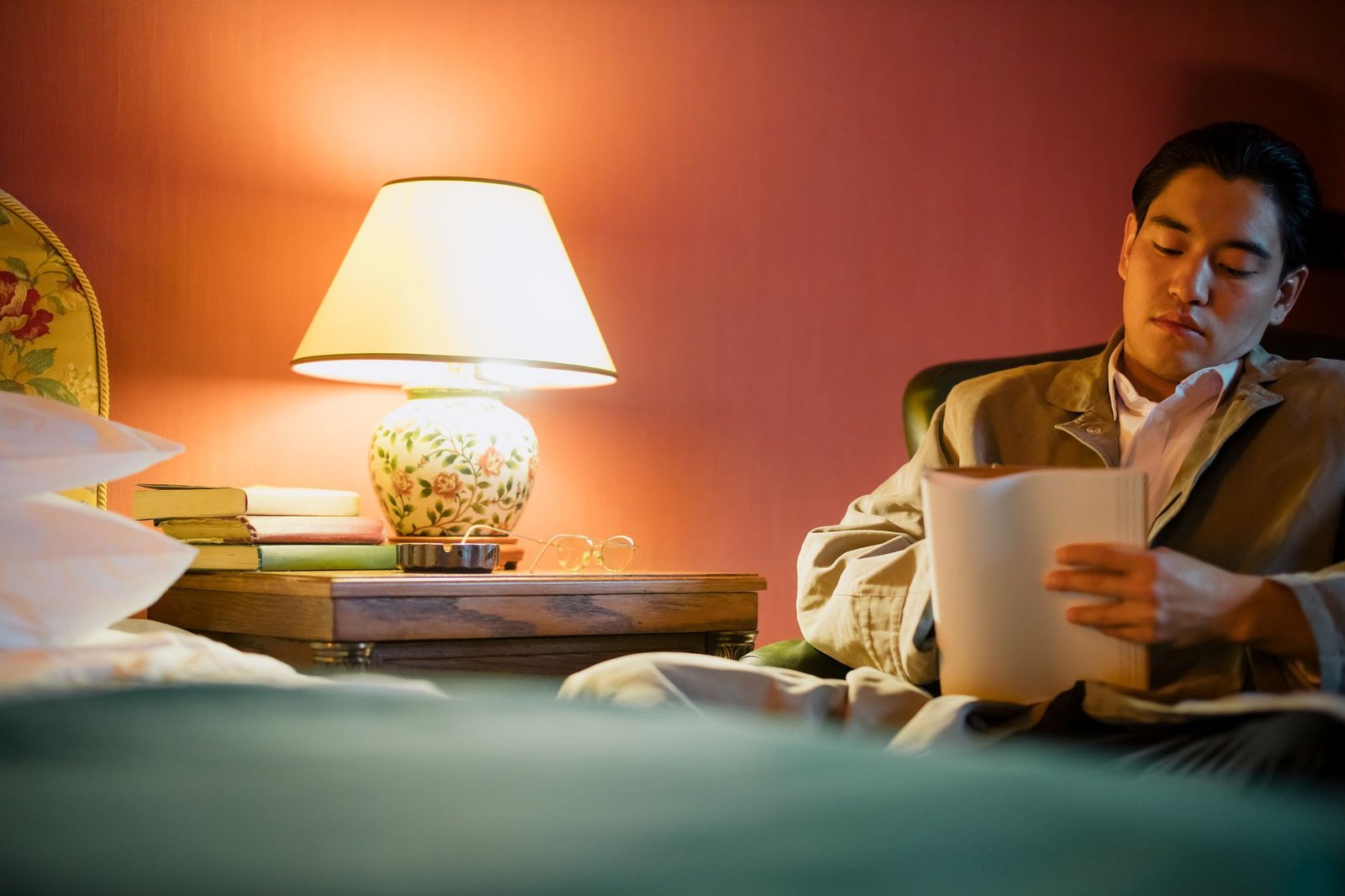 Quiet modern hotel room with a notebook and room key