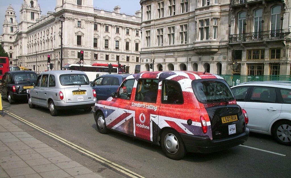 london, taxi, capital city, england, united kingdom, union jack, flag, british flag, city, traffic, cars