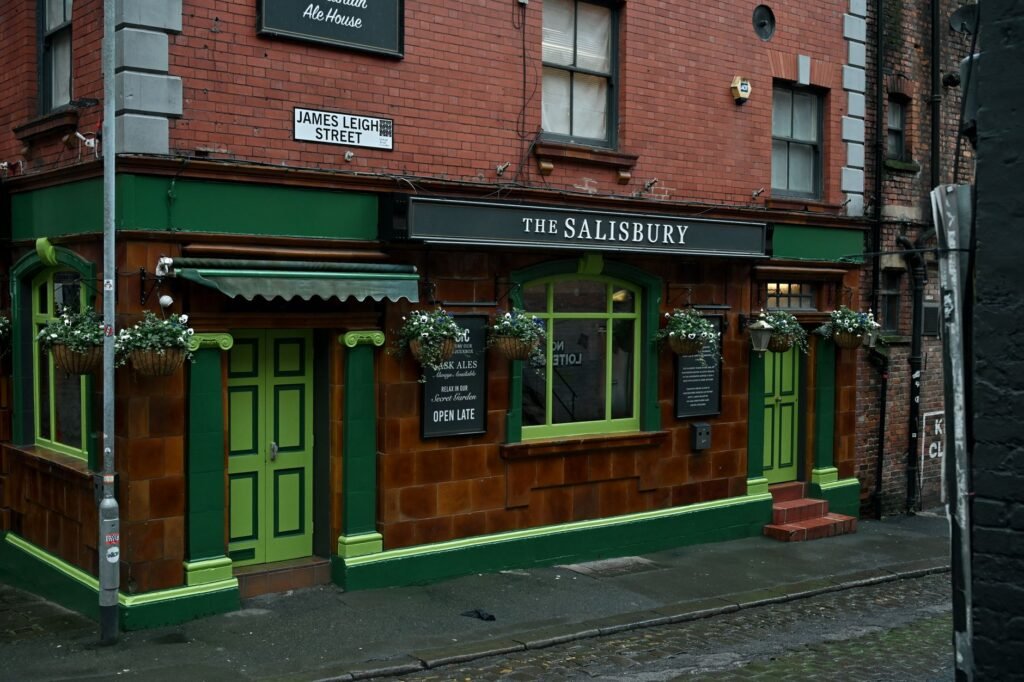 Exterior view of the Salisbury Pub with vibrant green accents on James Leigh Street.