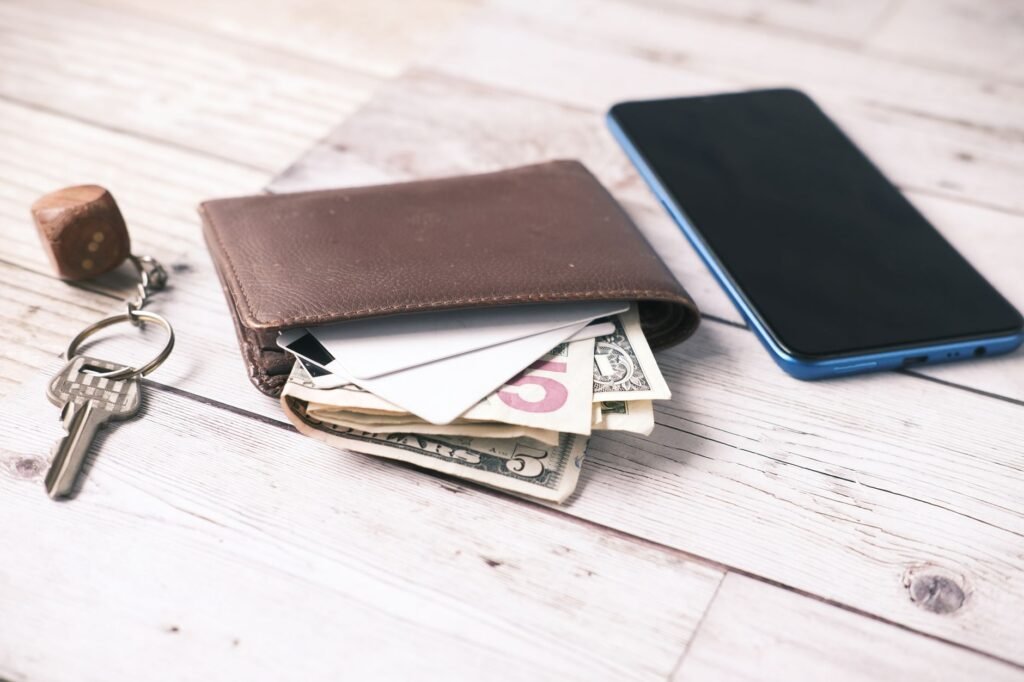 Phone, keys and wallet prepared for a planned journey