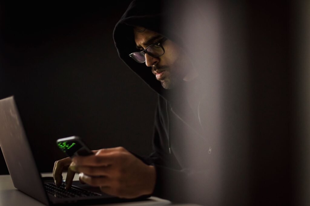 Using a phone and laptop to review a discreet online listing