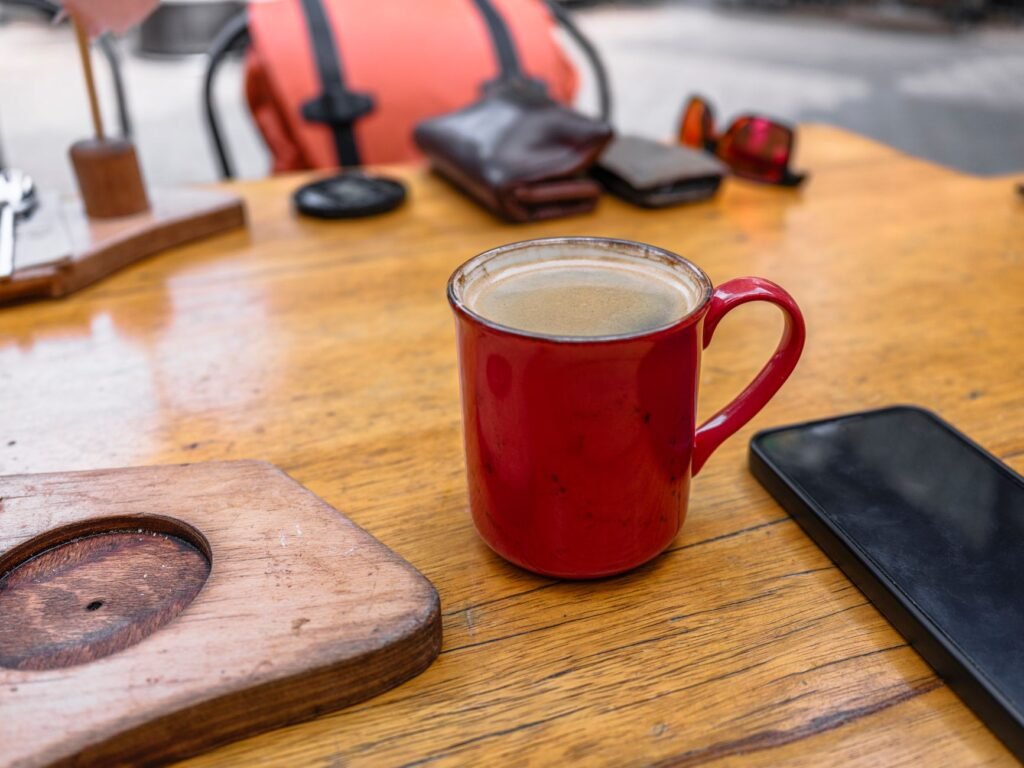 Smartphone, keys and travel wallet prepared for a planned visit