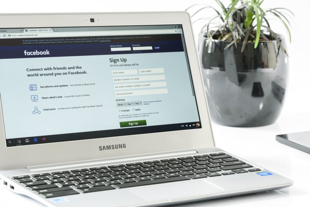 Adult reader reviewing profile information privately on a laptop