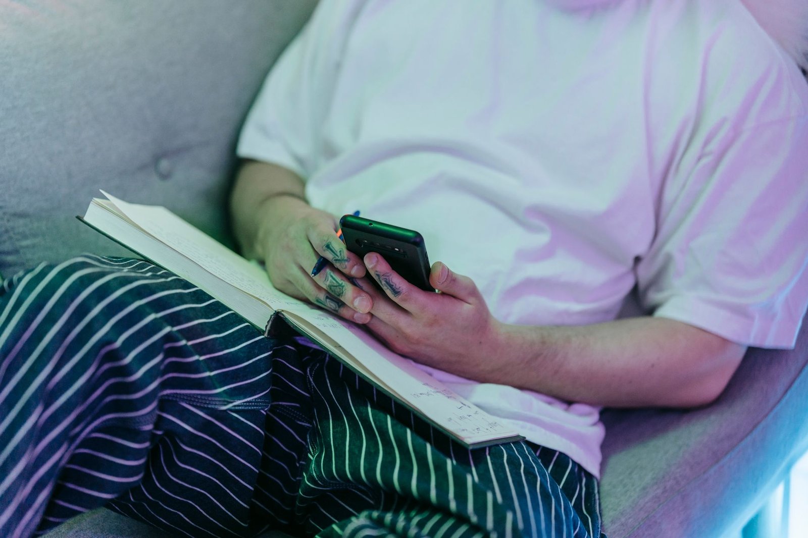Discreet hotel lounge setting in Harrogate with a notebook and phone