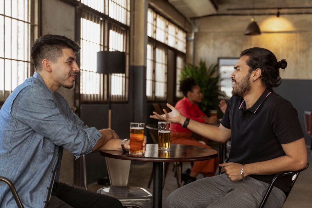 Two adults discussing arrangements in a quiet café