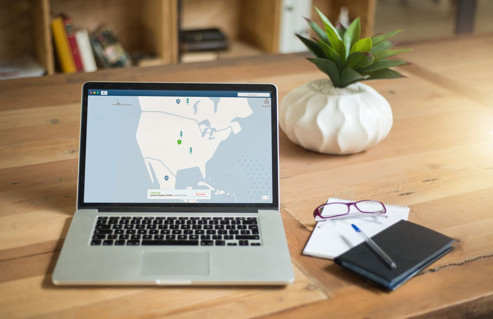 Traveller reviewing a directory privately on a laptop