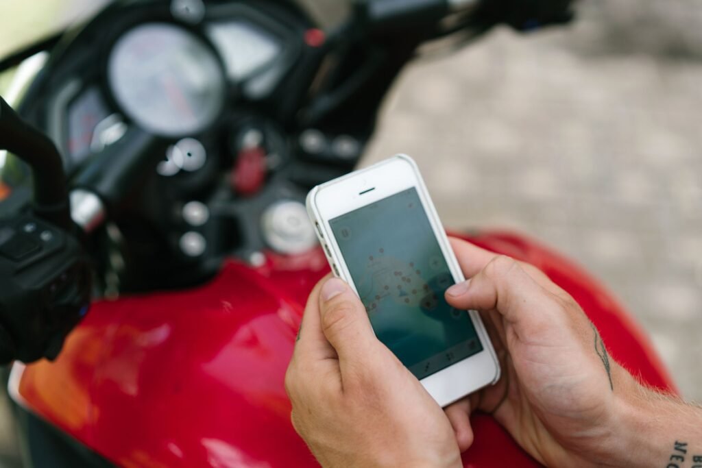 Person checking travel directions and appointment notes on a smartphone