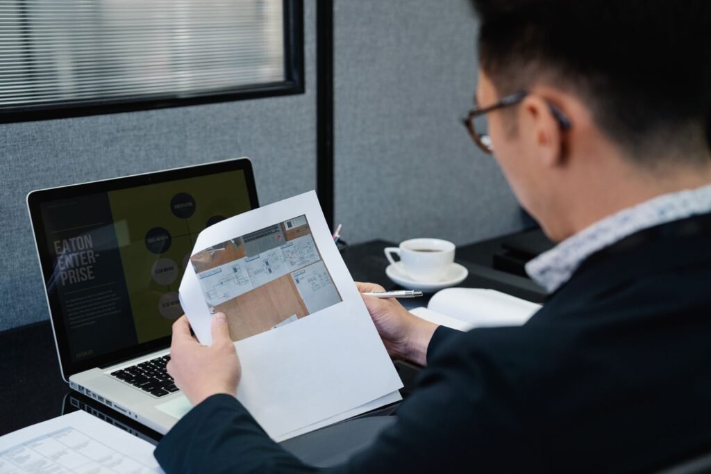 A visitor reviewing profile information on a laptop