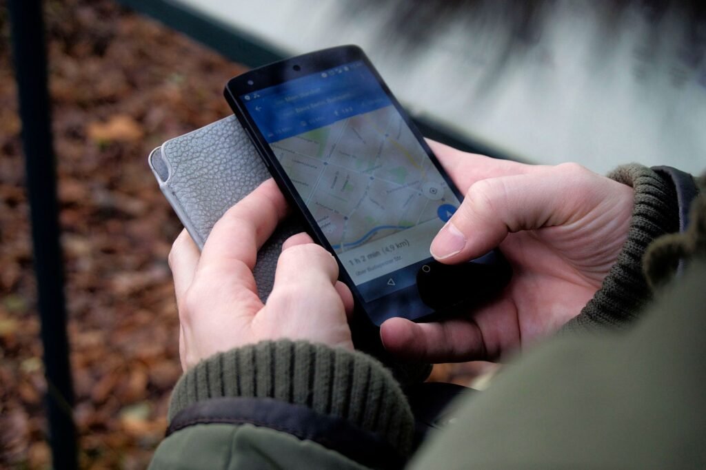 Adult traveller checking directions and appointment notes in Wolverhampton