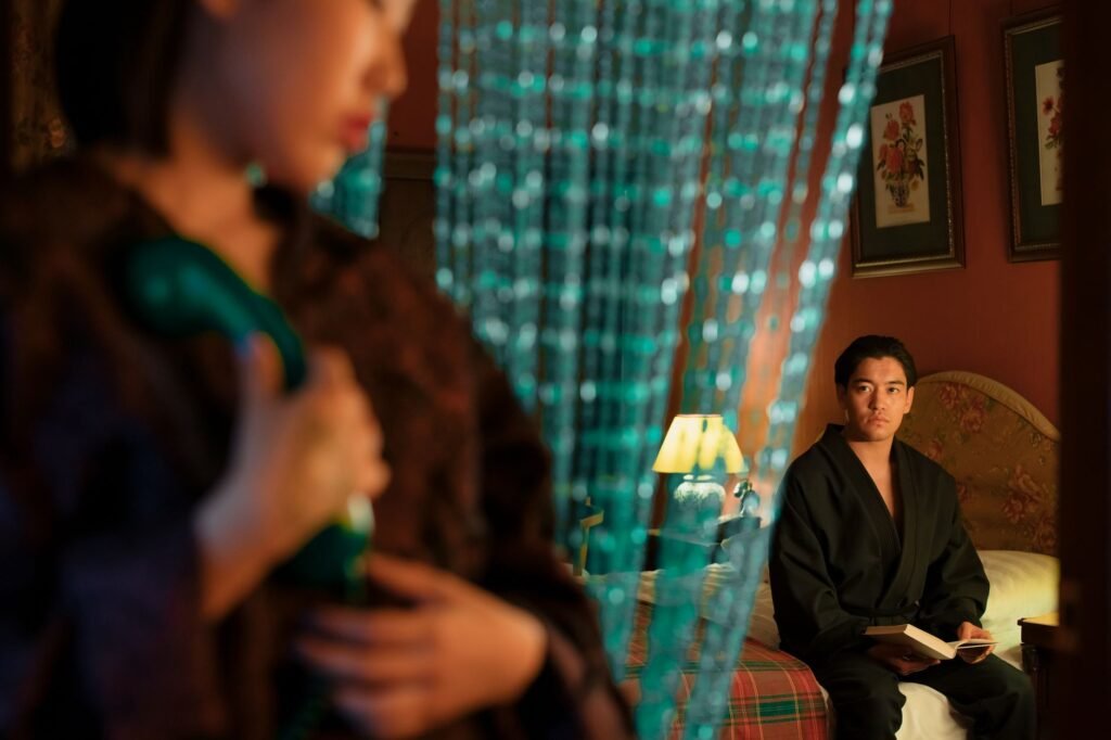 Two adults discussing arrangements in a quiet hotel lounge