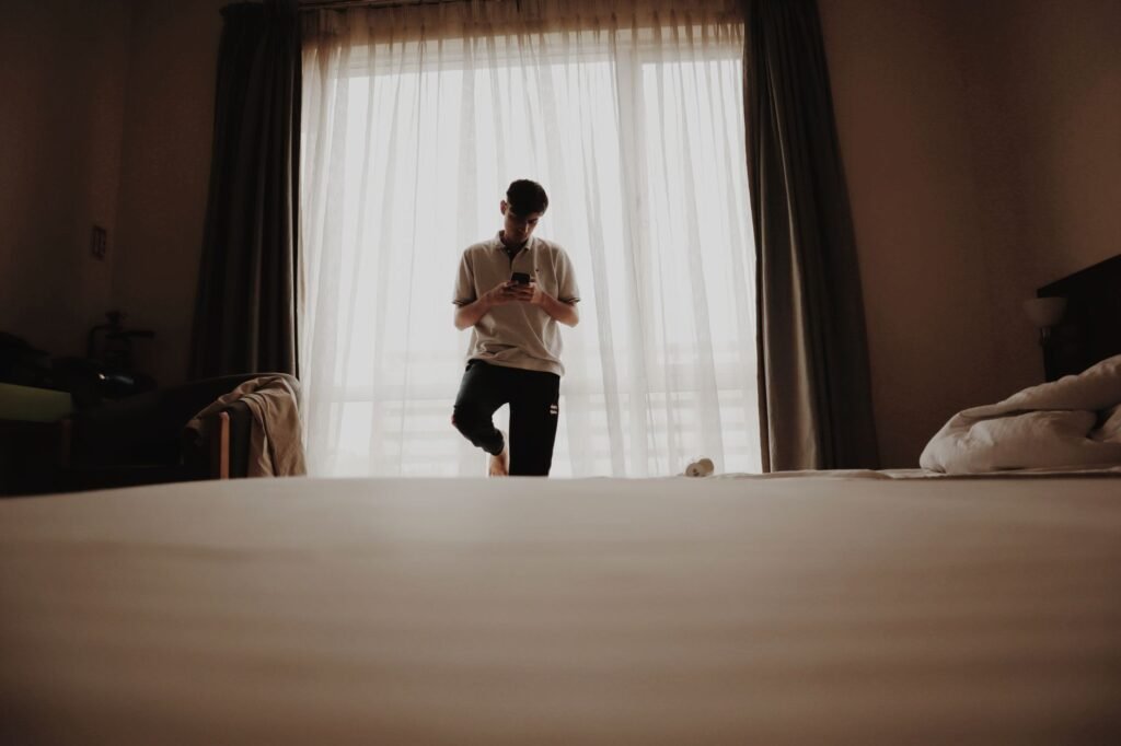 Traveller checking private booking details on a smartphone