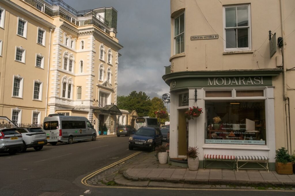 A picturesque street view in Bristol, featuring classic architecture and local shops.