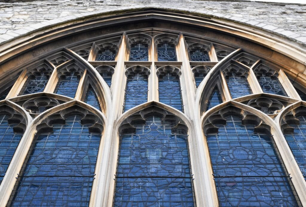 Close-up of the Gothic arched window at St Michael's Church in Southampton, England.