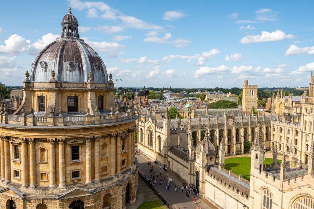 A beautiful aerial view of Oxford University's classic architecture on a bright day.