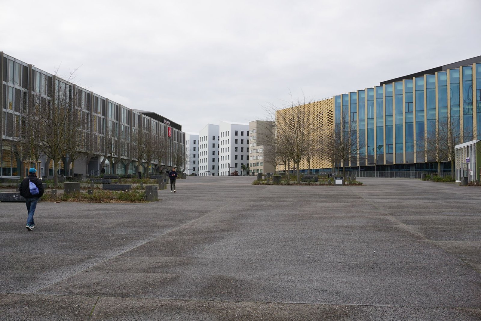Modern Milton Keynes streetscape with green space and pedestrian routes