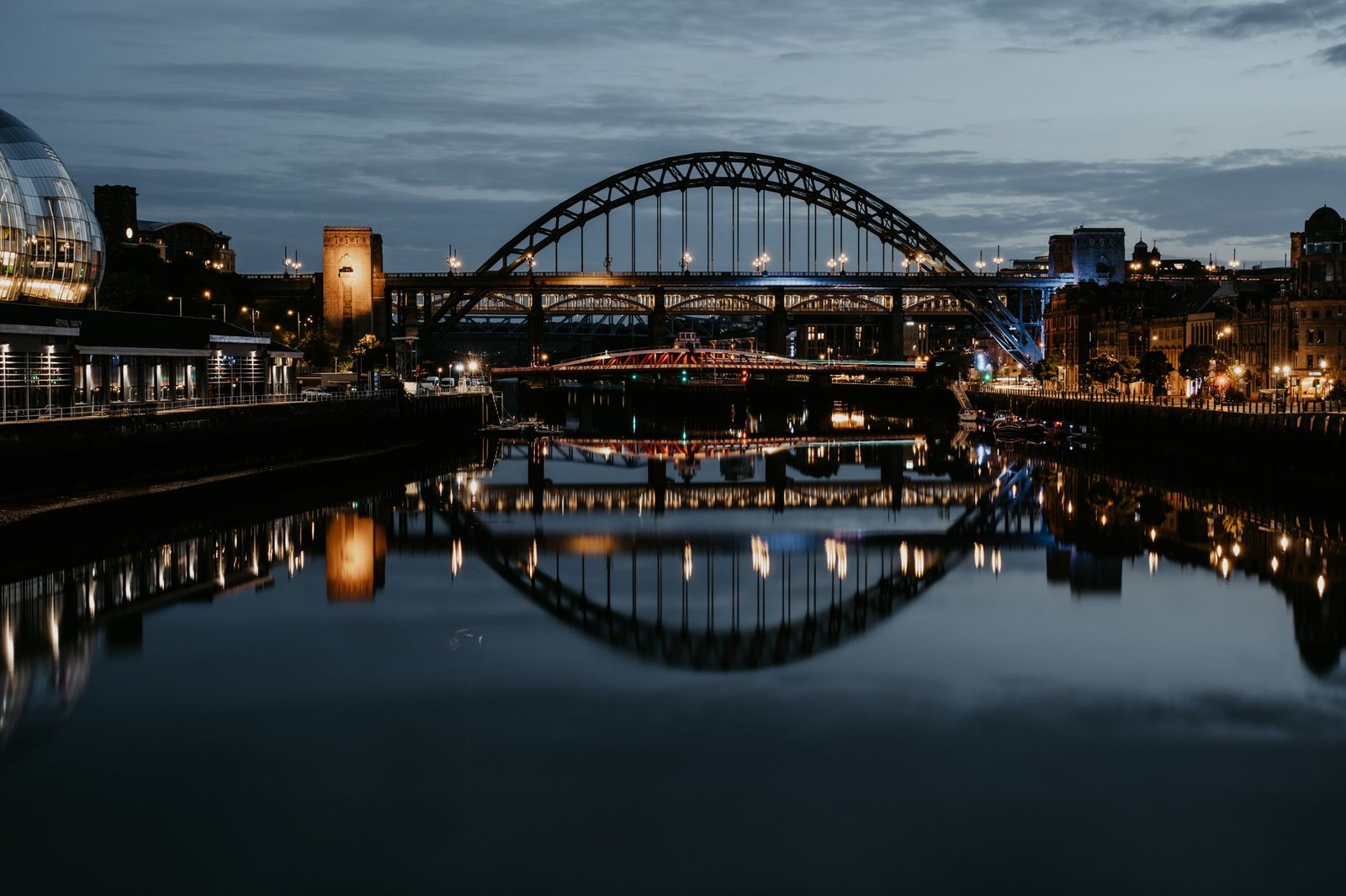 Newcastle upon Tyne skyline and Tyne Bridge at evening