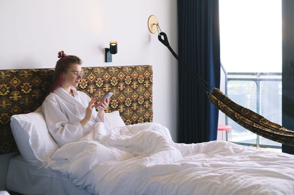 Traveller checking plans privately in a hotel room