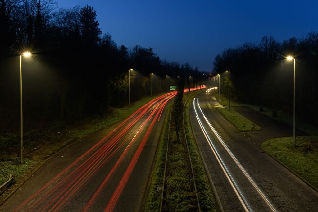 Long exposure of car light trails on a Craigavon road at dusk.